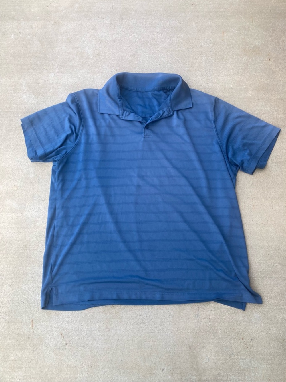 Blue striped polo shirt